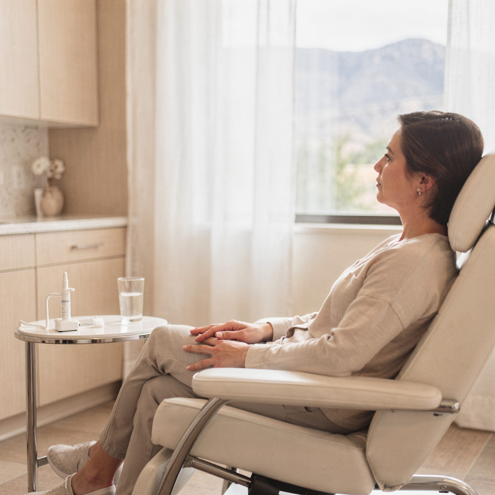 Patient seated in a comfortable treatment chair during a Spravato treatment session at Myndful Wellness